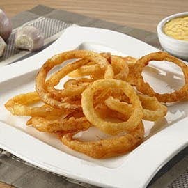 Aritos de cebolla rebozados en tempura Aritos de cebolla rebozados en tempura