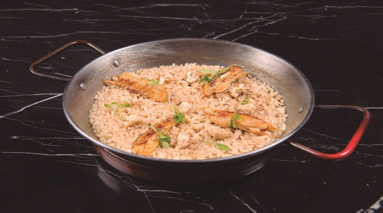 Arroz de verduritas, alitas de pollo y azafrán – - Receta - UFS