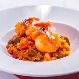 Arroz meloso de vieiras y langostinos al cava con lima Arroz meloso de vieiras y langostinos al cava con lima