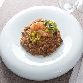 Arroz trufado con setas, gamba roja y piparra vasca Arroz trufado con setas, gamba roja y piparra vasca