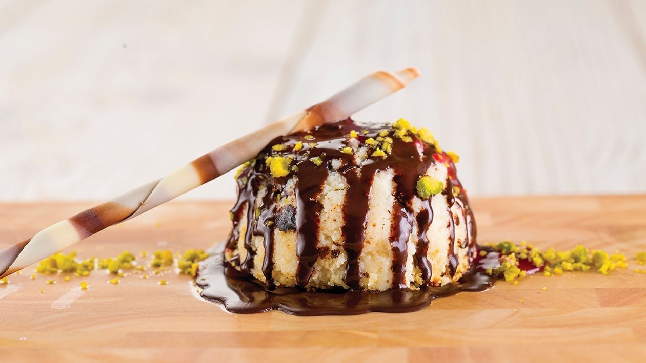 Bola de cheesecake con chocolate crujiente y pistacho – – Receta UFS