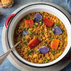 Lentejas guisadas con patata violeta, calabaza y garam massala Lentejas guisadas con patata violeta, calabaza y garam massala
