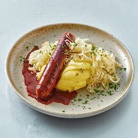 NoHotDog con puré, salsa gravy y chucrut NoHotDog con puré, salsa gravy y chucrut
