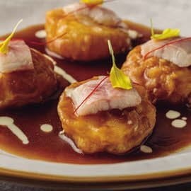 Patatas a la importancia con anguila ahumada Patatas a la importancia con anguila ahumada
