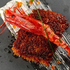 Socarrat de arroz a banda con carabineros Socarrat de arroz a banda con carabineros