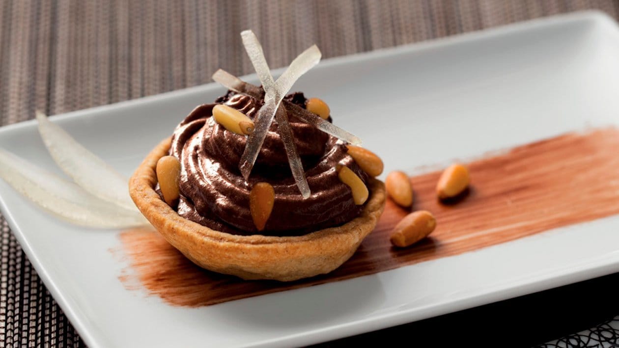 Tartaleta de mousse de chocolate y limón con piñones – - Receta - UFS