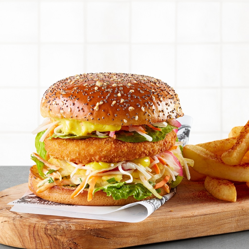 Hamburguesa Crispy de Nopollo con salsa curry massala y col Hamburguesa Crispy de Nopollo con salsa curry massala y col