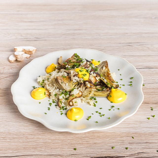 Arroz de setas, apionabo confitado y alcachofas con mayonesa de azafrán Arroz de setas, apionabo confitado y alcachofas con mayonesa de azafrán