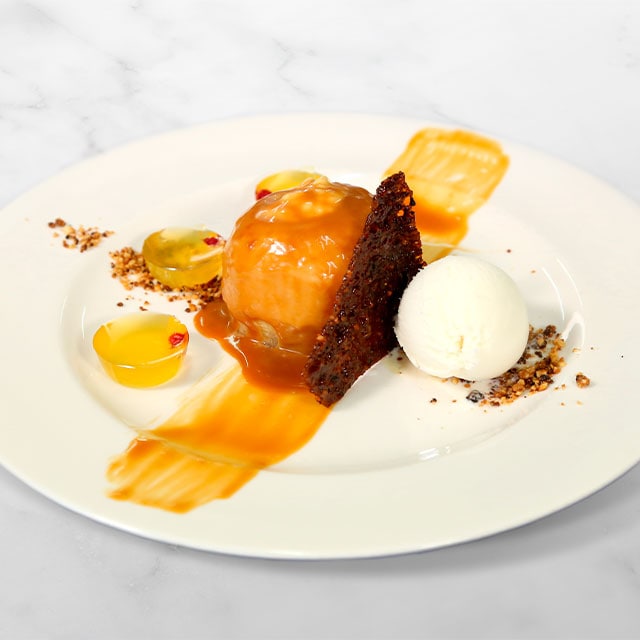 Manzana asada rellena de arroz con leche, gelée de sidra, toffee Manzana asada rellena de arroz con leche, gelée de sidra, toffee