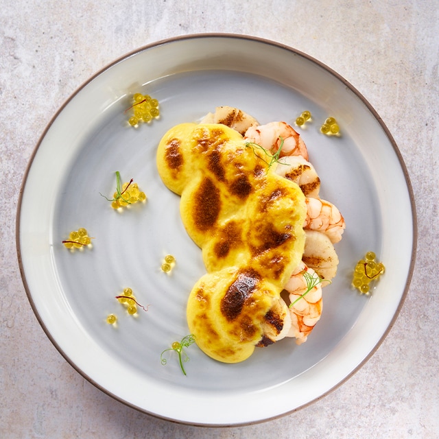 Gambas y vieiras gratinadas